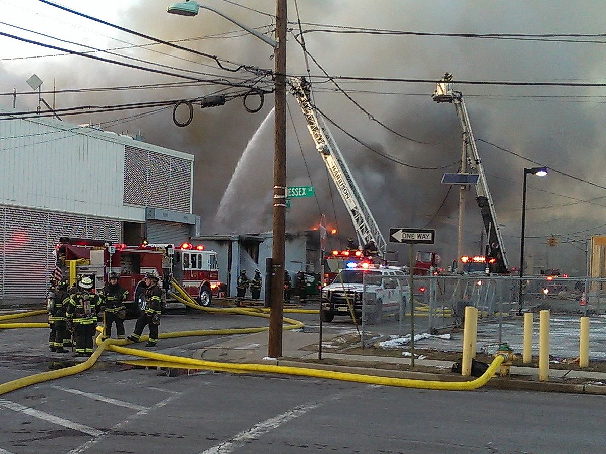 Harrison Firefighters Extinguishing Structure Fire
